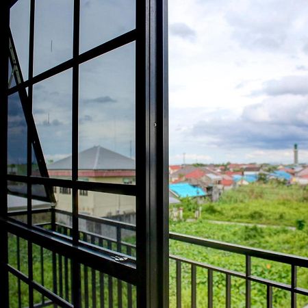 Oyo 90162 Remboelan Guest House Sungai Lutus Экстерьер фото