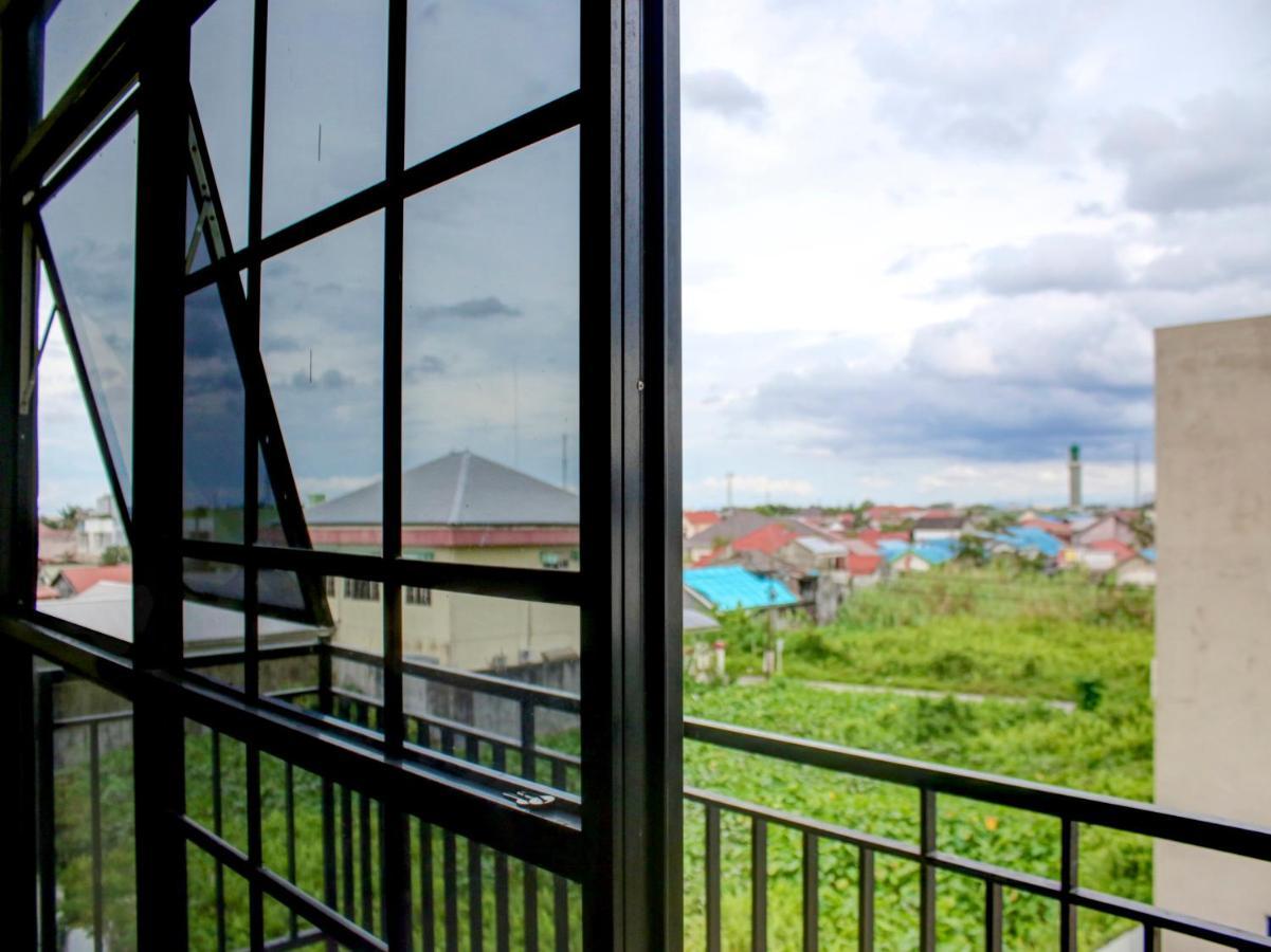 Oyo 90162 Remboelan Guest House Sungai Lutus Экстерьер фото